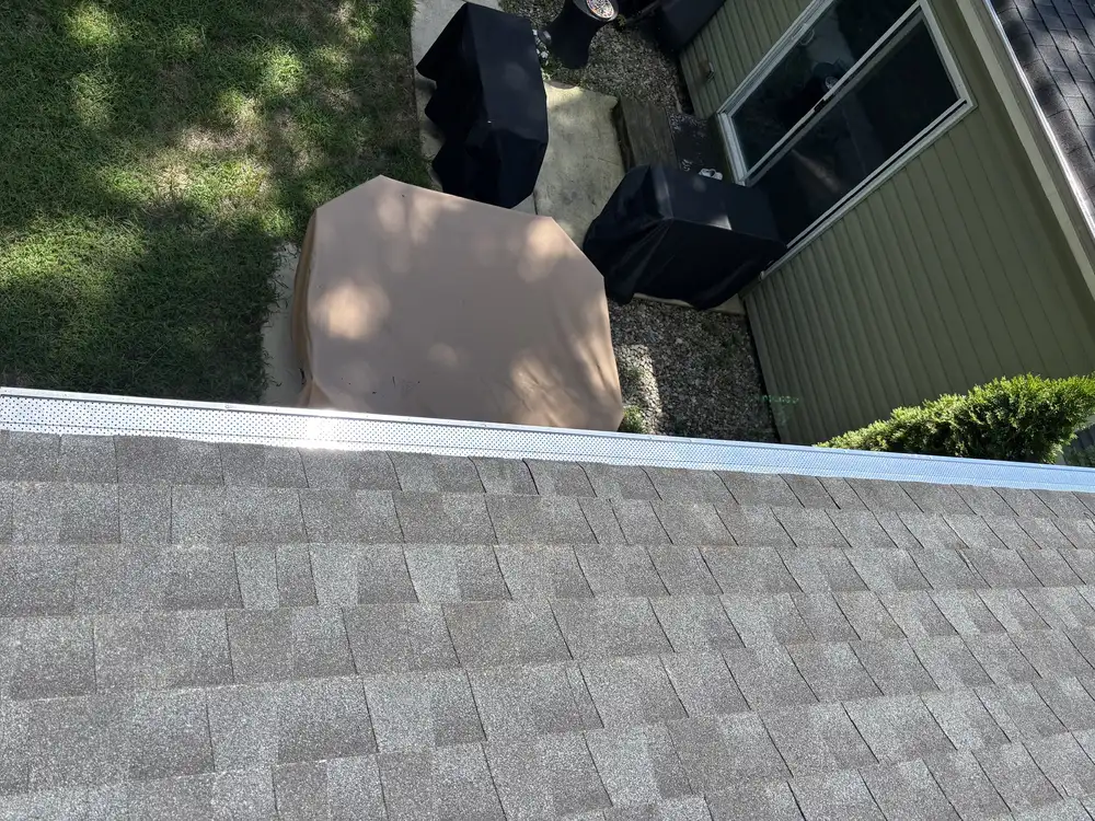 Gutter guard following the roof edge on a Gibbsboro home