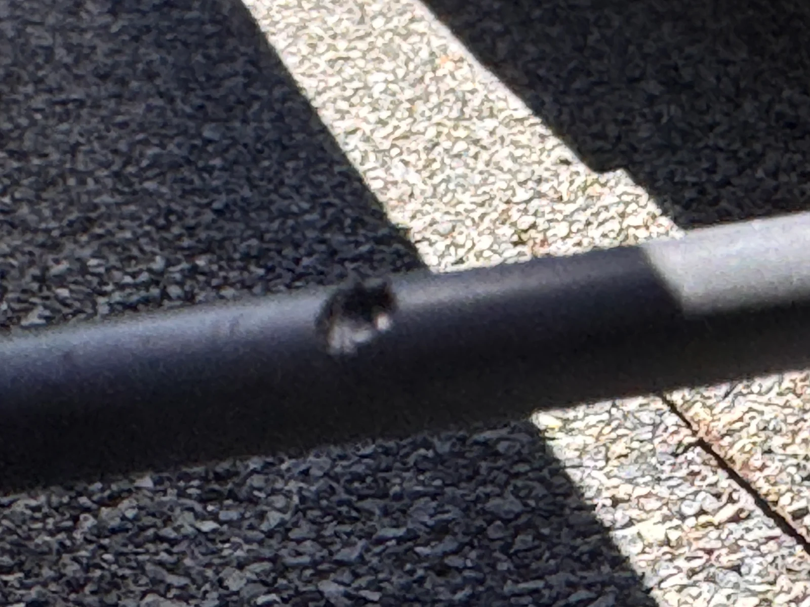 The damaged cable documented before repair