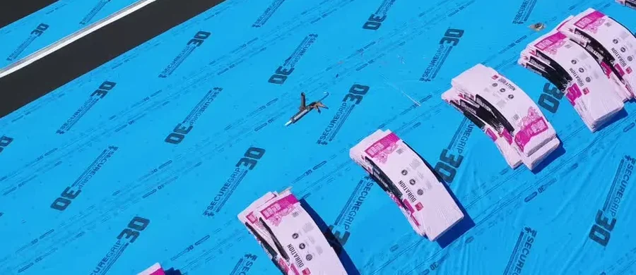 Underlayment and staged shingle bundles during roof replacement