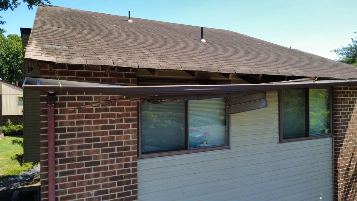 Deptford exterior finishing work showing gutters, soffit, and fascia