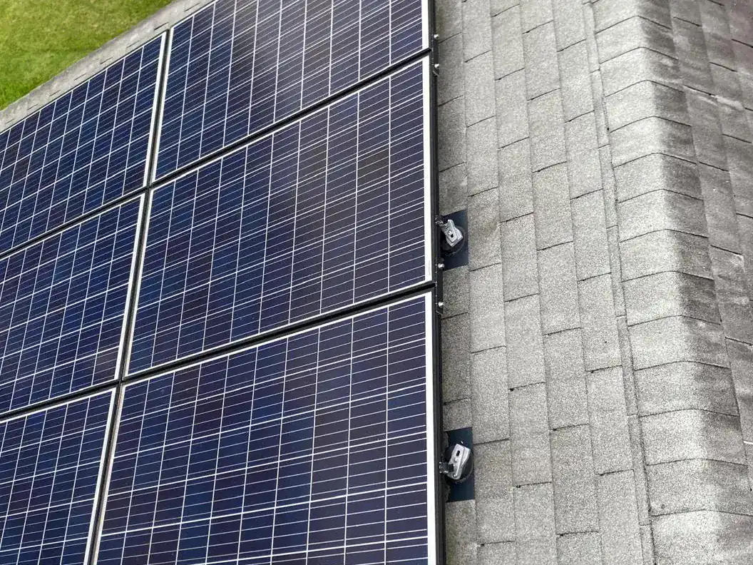 Rows of silver-framed solar panels with outer mounting points visible in New Castle, Delaware