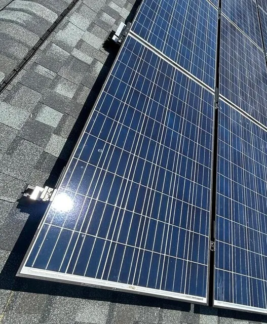 Close view of blue solar panels, silver frame edges, and mounting points in Pennsauken, New Jersey