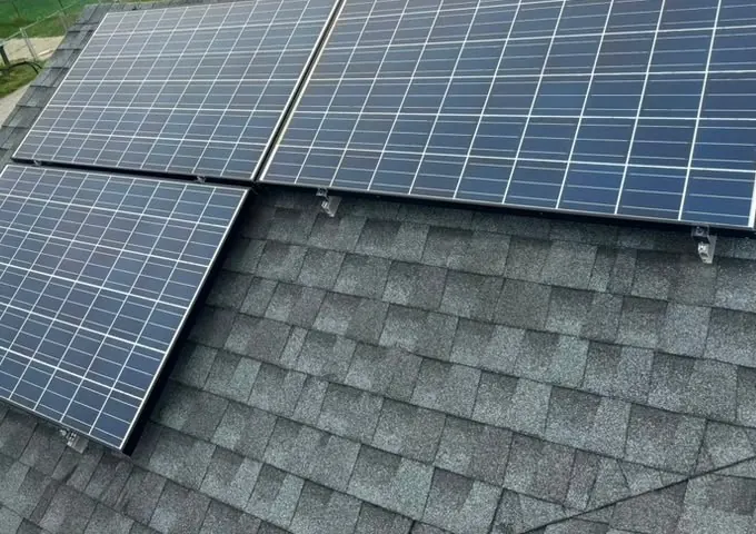 Dark solar modules arranged in offset sections in Villas, New Jersey