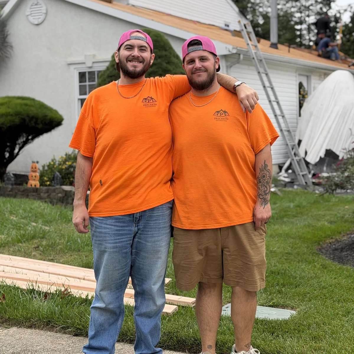 Sal and Pete, Owners of Precision Exteriors, together in company shirts